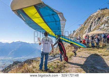 Rochers-de-naye, Canton Of Vaud, Switzerland - October 13, 2018: Hang-gliders In Swiss Alps From Top