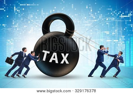 Businessman pulling kettlebell in tax concept