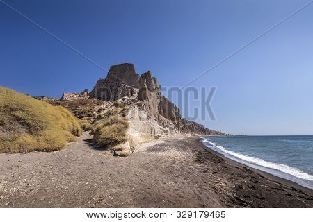 Canyon Mountains And Sea With Black Volcanic Beach On Vlychada.