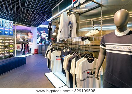 SHENZHEN, CHINA - CIRCA APRIL, 2019: interior shot of Fila store at a shopping mall in Shenzhen. Fila is an Italian sporting goods brand and company.