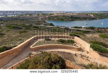 Cala Teulera Bay Near La Mola Fortress On The Island Of Menorca, Spain