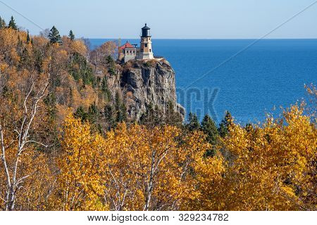 Autumn Fall Leaves With Split Rock Lighthouse In The Distance On Lake Superior Minnesota