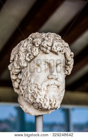 Athens, Greece - April, 2018: Portrait Head Of Ailius Verus At The Stoa Of Attalos In Athens