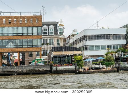 Bangkok City, Thailand - March 17, 2019: Chao Phraya River. Small Vivi The Coffee Place Building Amo