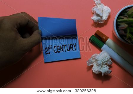 21th Century Write On Sticky Notes. Isolated On Pink Table Background