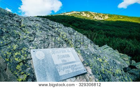 Bulgaria, Dobrinishte - 20 July 2019: Pirin Mountain, Bezboz Peak, Dobrin Dokov Tourist Gravestone, 