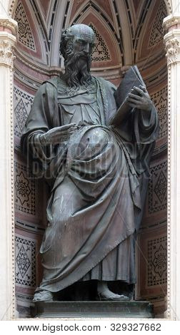 FLORENCE, ITALY - JANUARY 09, 2019: Saint John the Evangelist by Baccio da Montelupo, Orsanmichele Church in Florence, Tuscany, Italy