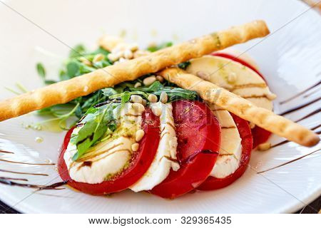 Portuguese Salad Snack Mozarela With Tomato And Wafer Rolls.