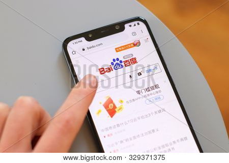 Warsaw, Poland - October 22, 2019: User Visiting Baidu Chinese Website On A Xiaomi F1 Pocophone Smar