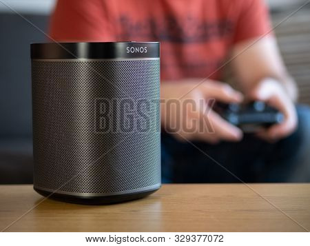 Uk, October 2019: Sonos Play Black Wireless Speaker With Gamer In Background