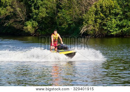 Ukraine, Sednev, The River Snov August 15, 2015: Sports Man Riding A Water Bike, Jet Ski. Extreme Sp