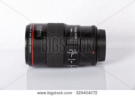 Canon Ef 100mm F / 2.8l Macro Is Usm Lens Of The Professional Series Isolated On White.