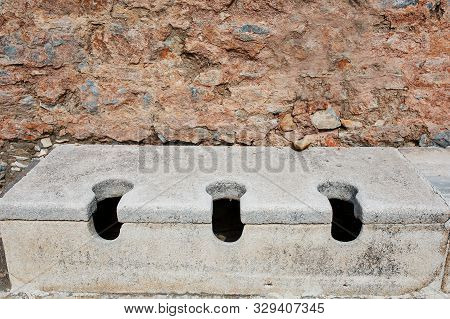 Antique Marble Public Toilet In The City Of Ephesus, Turkey.