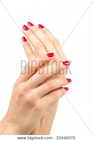 Kvinnliga händer rött manikyr Shellac koncept