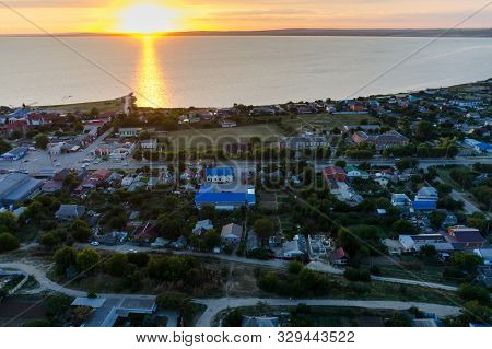 Sennoy, Russia - July 16, 2017: Beautiful Colorful Dramatic Sunset Sky Over The Silhouette Of Small 