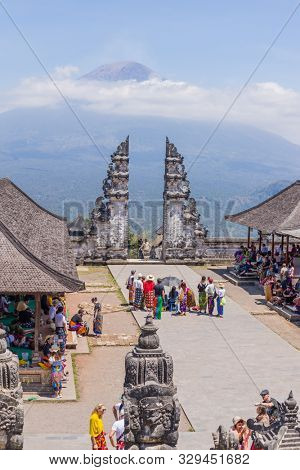 BALI, INDONESIA - SEPTEMBER 17, 2019: People at the temple of Pura Penataran Agung Lempuyang. In Bali, Indonesia