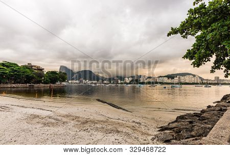 Praia Da Urca Beach At The Sunset In The Neighborhood Of Urca At The Sunset.