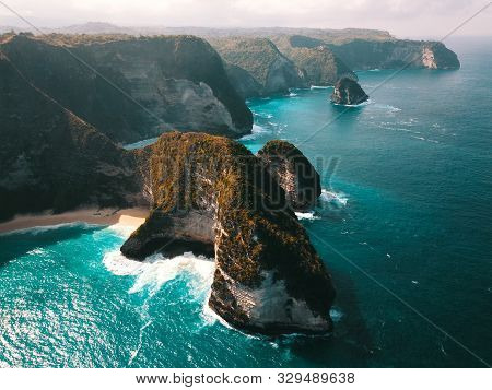 Dramatic Drone Shot From Kelingking Beach In Nusa Penida, Indonesia