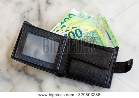 Lost Black Leather Wallet With Money Euro. One Hundredth Banknotes Inside It