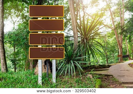 Copy Space Tourist Information Sign In National Park, Empty Direction Sign Board In Park