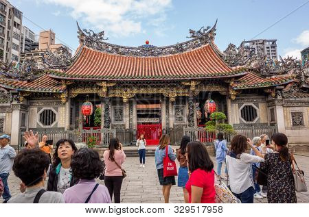 Taipei, Taiwan - October 20th, 2019: famous attraction of Lungshan temple at Taipei, Taiwan