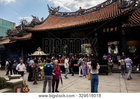 Taipei, Taiwan - October 20th, 2019: famous attraction of Lungshan temple at Taipei, Taiwan