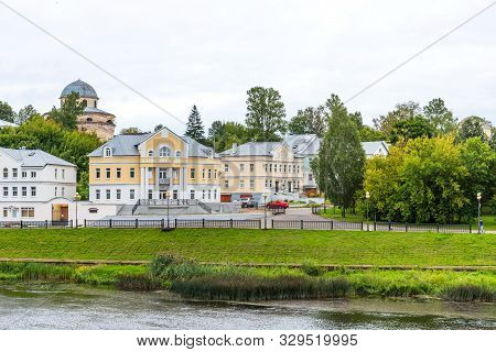 Torzhok, Russia - August 4, 2019: Panoramic Summer View Of The Embankment Of The Tvertsa River With 