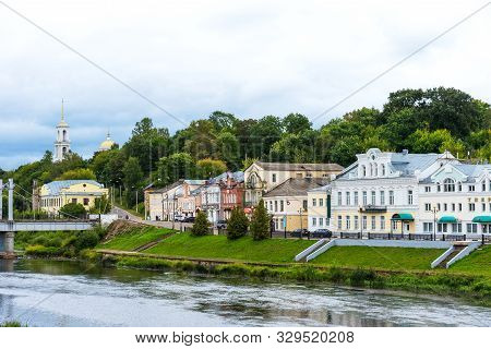 Torzhok, Russia - August 4, 2019: Panoramic Summer View Of The Embankment Of The Tvertsa River With 