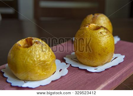 Baked Apples Antonovka On A Blurred Background.