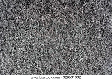 Dark Abstract Background And Pattern Of Interwoven Hairs, Fibers And Nanofibers. Sponge Detail Textu