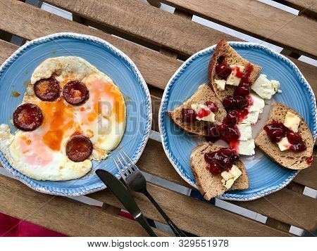 Turkish Breakfast Egg With Sucuk And Cranberries Jam / Marmalade. Organic Food.