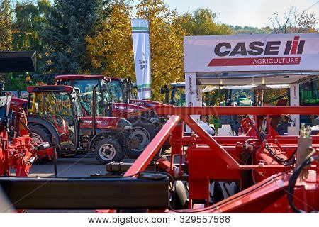 Chisinau, Moldova, October 22, 2019. Agricultural Machinery With Visitors At The Exhibition