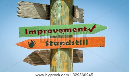 Street Sign The Direction Way To Improvement Versus Standstill