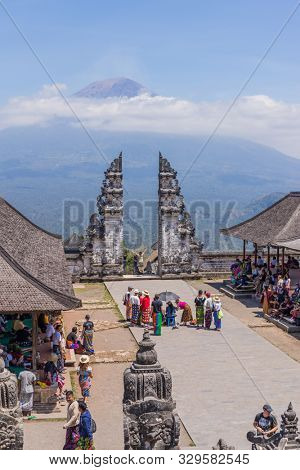 BALI, INDONESIA - SEPTEMBER 17, 2019: People at the temple of Pura Penataran Agung Lempuyang. In Bali, Indonesia