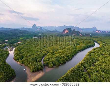 Aerial Top View Of Samet Nangshe And Tropical Green Forest Trees At Sunset With Andaman Sea In Phang