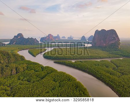 Aerial Top View Of Samet Nangshe And Tropical Green Forest Trees At Sunset With Andaman Sea In Phang