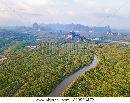 Aerial Top View Of Samet Nangshe And Tropical Green Forest Trees At Sunset With Andaman Sea In Phang
