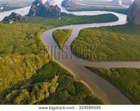 Aerial Top View Of Samet Nangshe And Tropical Green Forest Trees At Sunset With Andaman Sea In Phang