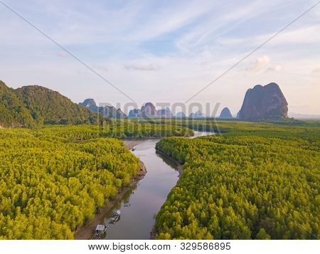 Aerial Top View Of Samet Nangshe And Tropical Green Forest Trees At Sunset With Andaman Sea In Phang