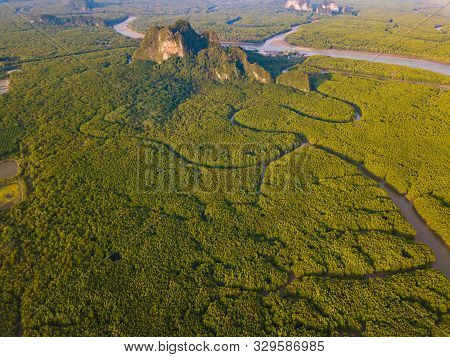 Aerial Top View Of Samet Nangshe And Tropical Green Forest Trees At Sunset With Andaman Sea In Phang