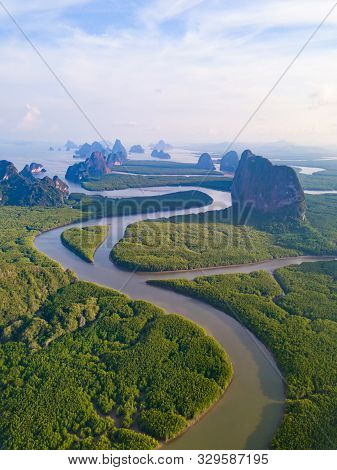 Aerial Top View Of Samet Nangshe And Tropical Green Forest Trees At Sunset With Andaman Sea In Phang
