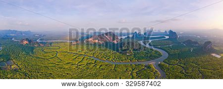 Aerial Top View Of Samet Nangshe And Tropical Green Forest Trees At Sunset With Andaman Sea In Phang