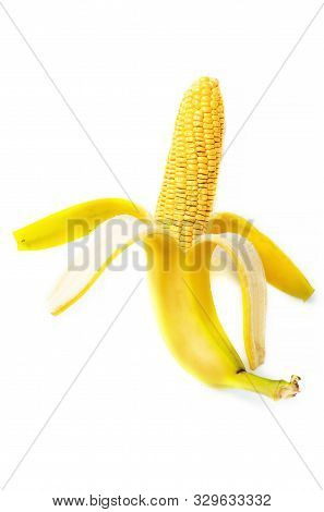 Unreal Corn Cob In Bannana Skin On White Background