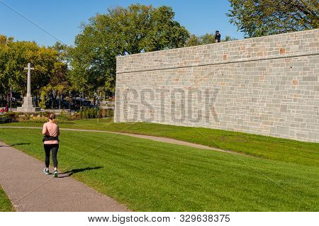 Quebec City, Ca - 5 October 2019 - Woman Running Near Quebec City Fortifications