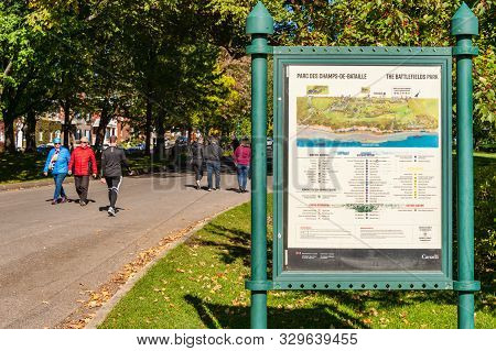 Quebec City, Ca - 5 October 2019 - People Walking In The Battlefields Park In The Autumn Season & Ma