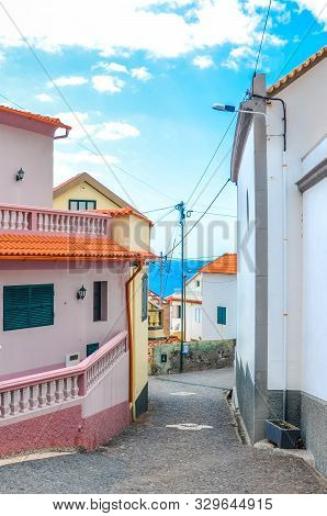 Houses In Coastal City Jardim Do Mar, Madeira, Portugal. Waters Of The Atlantic Ocean In The Backgro