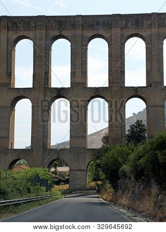Big Arches Of An Ancient Aqueduct Called Carolino Near Caserta City In South Italy