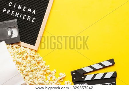 Cinema Concept. Popcorn In A Box, Movie Clapper, Vhs Video Cassette Tape And Letter Board With Words