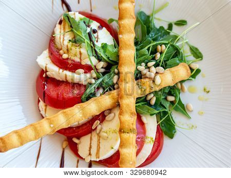 Portuguese Salad Snack Mozarela With Tomato And Wafer Rolls.