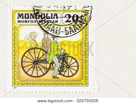 Seattle Washington - October 4, 2019:  Male Rider On First Pedal Bike Called The Macmillan, Invented
